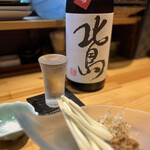 北新地ここの - しまらっきょうには肉味噌と塩で。お酒は滋賀の北島。超辛口+10 