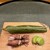 味享 - 料理写真:❶﻿桜の葉で包んだサクラマスと花山椒、ホタルイカ、そら豆の蜜煮。