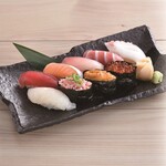 Nine pieces of nigiri with medium-fatty pieces