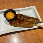 Uotami - つくね串卵黄添え。