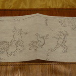 梁山泊 - チョッとお洒落なコースターを拡げると・・・