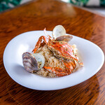 Seafood tomato cream risotto with crab and clams