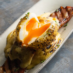 Eggs Benedict-style potato salad with soft-boiled eggs and grilled bacon