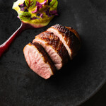 Roasted duck breast, star anise and honey marinade, sweet bean paste and Cointreau sauce