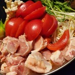 個室居酒屋 鳥楽 - 九州地鶏トマト鍋。歯ごたえある鶏肉に野菜てんこ盛り。