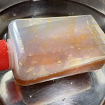 ラーメン もっけだの - 『冷凍油そば』のタレ(湯煎中)