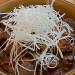 びすとろUOKIN - 蒟蒻いりビストロ風牛もつ煮込み