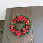 フォリオリーナ・デッラ・ポルタ・フォルトゥーナ - 入口のリース