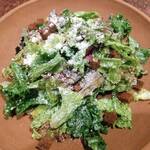 Caesar salad with walnuts and cheese