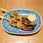 Grilled squid skewers with garlic soy sauce