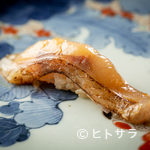``Nodoguro Nigiri'' is completed through the process of pickling and grilling.