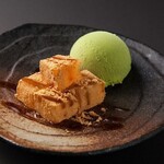 Warabi mochi and matcha ice cream with brown sugar syrup sauce