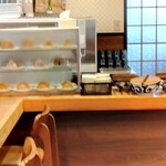 Yakushi Udon - 店内 右の方はサービス品 昆布煮等々  ケース内は有料ですよ(笑)