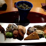 おかもと - 八寸（もずく酢・じゅん菜、炙った干しホタルイカ、白和え、空豆、イイダコ、鱈の子、芋の田楽、蘇、こごみの白胡麻和え、琵琶湖産稚鮎、からすみ揚げ）