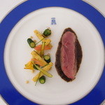 トゥールダルジャン - 幼鴨のロースト　オリーブ風味
      ハーブのバニスと花ズッキーニを添えて