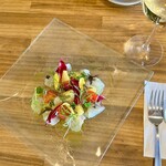 トラットリアイルポッツォ - 鮮魚のカルパッチョ（ソースは季節により変更します）