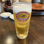 中華料理 成喜 - ちょいと口をつけた生ビール。ここのグラスは泡が付きません。素晴らしい。