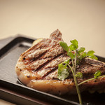 STEAK HOUSE - 国産骨付き豚ロースのステーキ