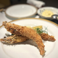 洋食 つばき - こちらだけが初オーダーの車海老フライ。
                      大振りだし、タルタリストの私には嬉しい一品。
                      もちろん、美味しい！