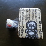 うなぎの留さん - 包装紙もたぬきが主役・・・