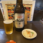 Motsuyaki Togaya - お通しと瓶ビール