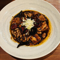 魚China YO - 美味しかった旨辛魚介の麻婆豆腐！たらの白子がクリームチーズみたい♡