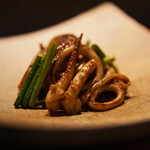Squid, shiitake mushrooms and seasonal vegetables stir-fried with garlic and soy sauce