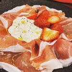 Stracciata cheese, seasonal fruits, and Spanish Prosciutto