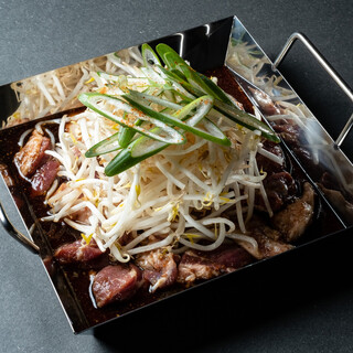 Our famous Chili Tori Hot Pot! Recommended is the ``Nikuyaki Tsurami'' with special soy sauce.