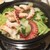カムオーン - 料理写真:タコの石焼きサウナ風ハーブビール蒸し✨ヘルシーな鍋料理。サウナ石が敷かれています。葉野菜とタコを生姜の効いたタレで。
