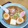 どさん娘  - 豚骨醤油ラーメンにバタートッピング