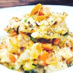 Addictive potato salad on the iron plate Warm potato salad with seaweed