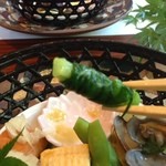 おぐら - これは一文字（ひともじ）ぐるぐるだよ、ワケギを巻いたものである。