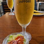 QWAN - 生ビール750円  お通し400円