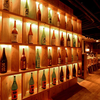 Inside the store, the entire wall is filled with sake.