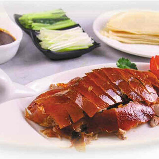 ``Peking duck'' with fluffy meat and crispy skin that is pasteurized in a special oven.