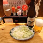 博多かわ屋 - つき出しと瓶ビール