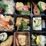 泉仙 - ¥1,200-のお弁当。湯葉や生麩、田楽、雁もどき、煮しめ、散らし寿司、炊き込みご飯等…色々。