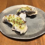 “Oku Oyster” from Okayama Prefecture, grilled with coconut butter and gapao with herbs