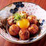 Grilled meatballs with egg yolk