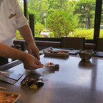 鉄板焼ステーキ 一ッ葉ミヤチク - 火を付けるのはお約束です。