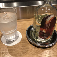 TROIS VISAGES - 銀座の喫茶店で作られる大量のオレンジジュースの皮を使って作られたオレンジのスピリッツ。SDGsです。エチレットに銀座の文字