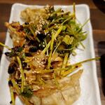 Motsuyaki Butaichi - パクチー餃子