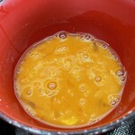 ラーメン もっけだの - 『朝食セット(ラーメン)』の『生卵+カエシダレ』