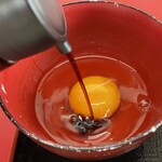 ラーメン もっけだの - 『朝食セット(ラーメン)』の『生卵+カエシダレ』