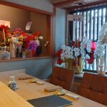 すしやのたい悟 - 店内の花輪