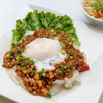 Sen'yai fresh noodles tossed in ground beef, topped with a soft-boiled egg