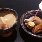 桔梗屋 - 付きだし。いちじくのゴマだれ・バイ貝と魚の南蛮