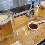 ホルモン焼 しのぶ - 生ビールとアゴ刺しのタレ