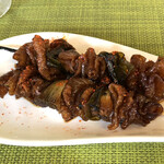 慶 - お通し（もつ串焼き）